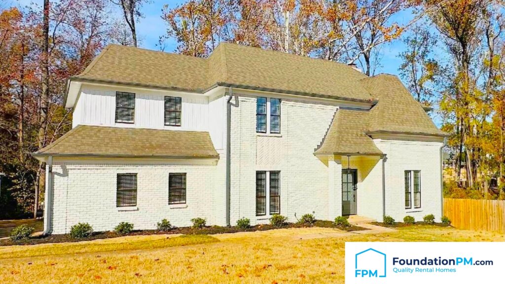 Property manager inspecting a well-maintained rental home in Memphis