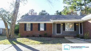 A Memphis property manager inspecting a rental home for safety and maintenance.